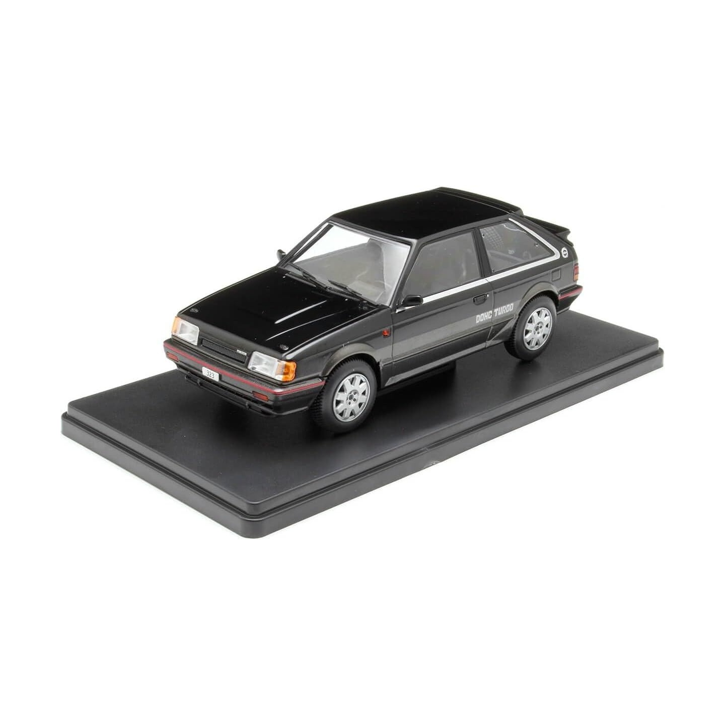MAZDA 323 4WD TURBO NEGRO WHITE BOX 124222 ESCALA 1/24